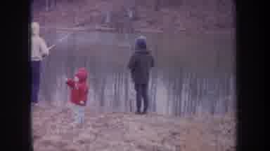 Michigan USA (1968): Three People Are Doing Fishing In A Small Pond On A Cold Day