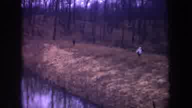 Michigan USA (1968): People Walking Down A Dike Road