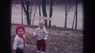 Michigan USA (1968): Two Children Standing In Front Of Lake