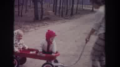 Michigan USA (1968): Two Women And Two Children Walking And Riding Along A Dirt