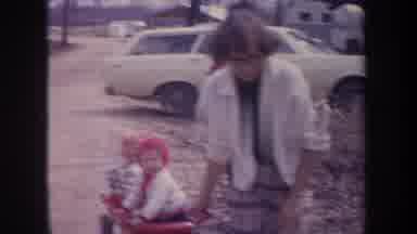 Michigan USA (1968): Going To The River With Kids Riding In Little Red Wagon