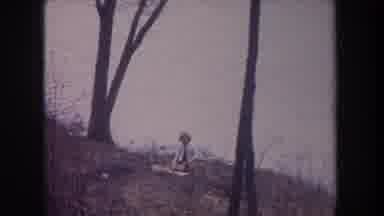 Michigan USA (1968): Woman Sitting By The Water's Edge Then Switches To Three