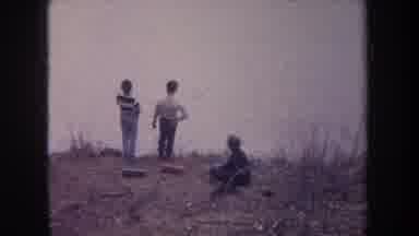 Michigan USA (1968): Kids Relaxing By The Water Sitting Talking And Fishing In