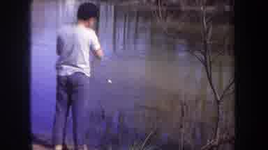 Michigan USA (1968): Child Luring In A Fish Out Of The Lake And Observes The Fish