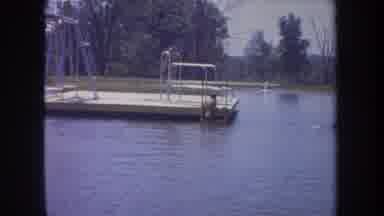 Michigan USA (1968): A Little Boy Practicing In The Swimming