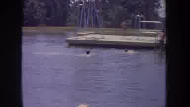 Michigan USA (1968): Fun At The Lake Everyone Gathered Swimming And Sitting