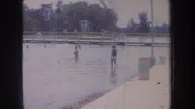Michigan USA (1968): Public Pool Kids And Teenagers Roaming Around Feeling Hot And