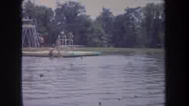Michigan USA (1968): A Beautiful Water Park With Trampoline And People Having Fun