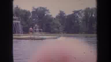 Michigan USA (1968): The Person Try To Jump In The Pool