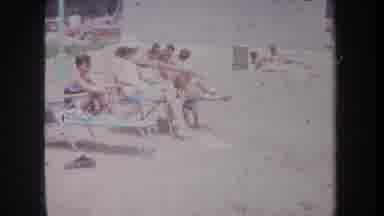 Michigan USA (1968): A Baby Run To The Water For First Time In The Lake During A