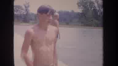 Michigan USA (1968): Man Standing Near The Poolside