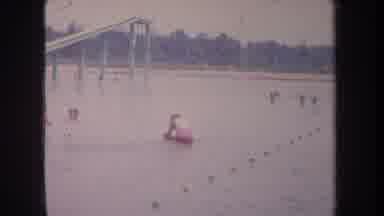 Michigan USA (1968): Swimming Area For Children In A Lake With A Big Water Slide