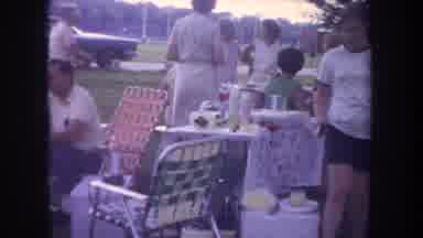 Michigan USA (1968): People Congregating And Eating At A Social Or Family Event