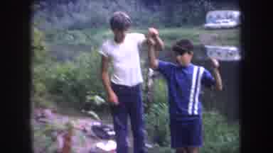 Michigan USA (1968): Two Boys Displaying A Caught Fish