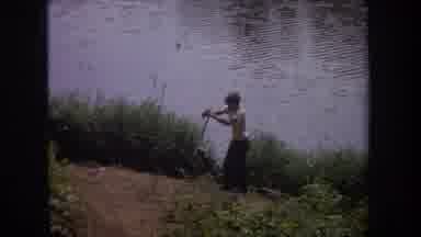 Michigan USA (1968): Group Of Friends Catching Fish From The Lake