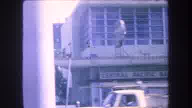 Hawaii USA (1969): Bustling Beach Town Square Cars Driving 60'S Or 70'S Era