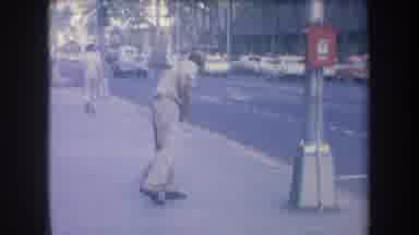 Hawaii USA (1969): Man Sweeping The City Sidewalk With A Giant Broom