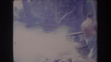 Hawaii USA (1969): Hawaiians Roasting Pigs On The Pit