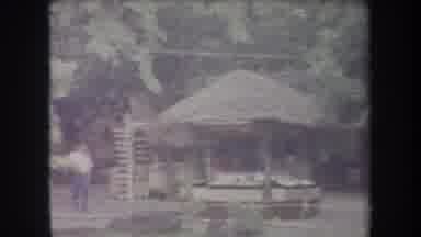 Hawaii USA (1969): Few People Walking Around In A Lush Garden Where There Is A
