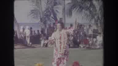 Hawaii USA (1969): Woman With Flower In Hair Dancing On Sunny Lawn Near Water