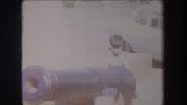 Hawaii USA (1969): Small Child Playing Between Two Old War Cannons In A Town