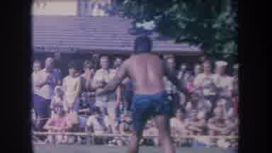 Hawaii USA (1969): Native Man Dancing Ritual Twirling Sticks Audience Crowd