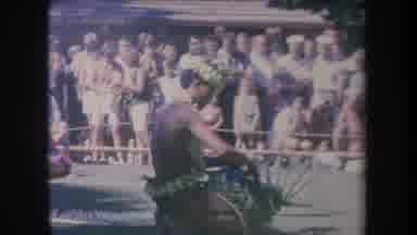 Hawaii USA (1969): Hawaiian Man Wearing Traditional Attire And Flower Lei Weaves