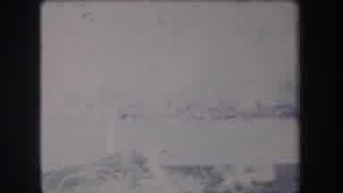 Hawaii USA (1969): Group Of People Standing At The Edge Of Shining Body Of Water