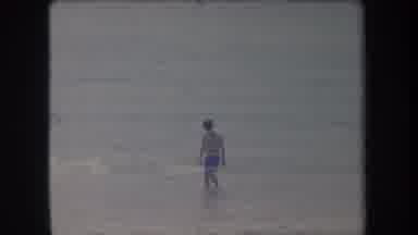 Hawaii USA (1969): Teenager Bathing In The Sea And A Speedboat Passing Away At
