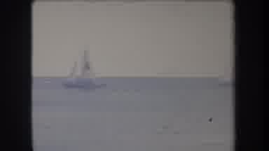 Hawaii USA (1969): Two Sailboats Slowly Cruising Along The Open Calm Waters On A