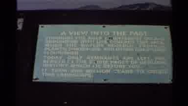 Western USA (1980): Sign Reading "View Into The Past" Clears To Show Mountains And
