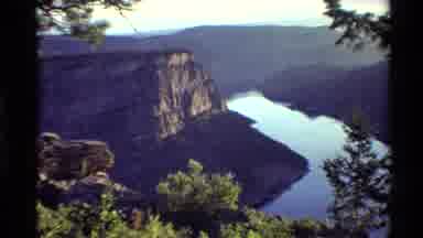 Western USA (1980): The River Is Running In Between Two Hills Looking The Nature