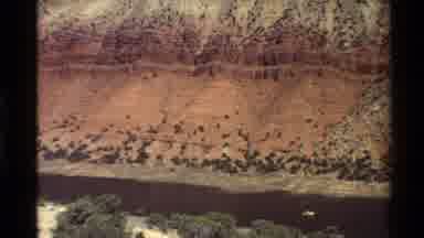 Western USA (1980): River Running Through A Deep Canyon On A Bright Day