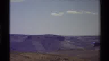 Western USA (1980): Close-Up Shot Of The Mountains That Stand Beyond The Grassy