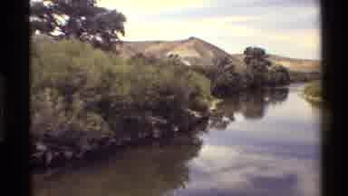 Western USA (1980): Grey Memorial Marker And Still River And Mountain