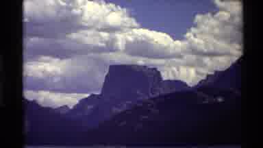 WESTERN USA-1980: Large Mountain With White Puffy Clouds And Lake View