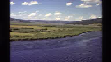 Western USA (1980): Rolling Hills With Lake And Open Grassy Area And Bright Blue