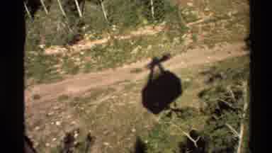 Western USA (1980): Red Cable Car Overlooking Small Town Surrounded By Farmland