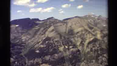 Western USA (1980): View From A Mountain With Some Trees And Some Patches Of Snow