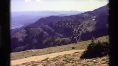 Western USA (1980): Mountain View With A Sand Walkway And A The Sky And Further