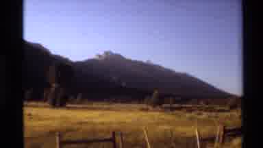 Western USA (1980): Small River With Grass Surrounding And There Is A Hill With