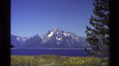 Western USA (1980): Grassland Followed By A Lake And A Large Mountain In The