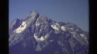 Western USA (1980): Snow Covered Mountain Lake And Trees On Clear Sunny Winter Day