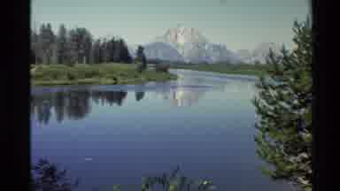Western USA (1980): Clip Of A River With A Mountain Background Then Zooms Into A
