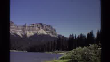 Western USA (1980): Blue Sky Tree Topped Mountain Range Direction Sign Majestic