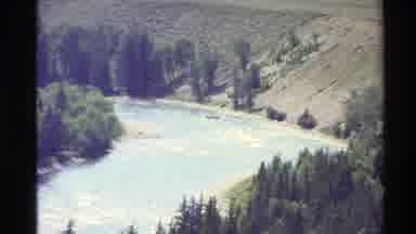 Western USA (1980): Wild Raging River Flowing Into The Mountains As The Water Has