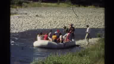 Western USA (1980): Canoe Boat With People On A River Bank