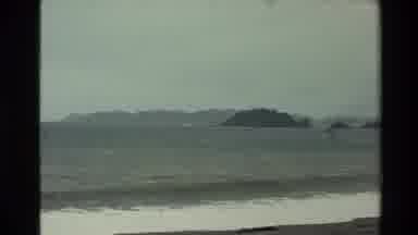 New Zealand (1981): Water Waves By The Beach There Are Four Big Rocks Near The