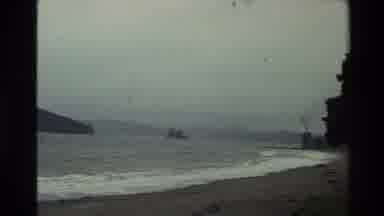 New Zealand (1981): Maori War Canoe Oceanfront With Mountains Nearby