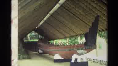 New Zealand (1981): Large Wooden Boat With Many Seats Under A Shelter With A